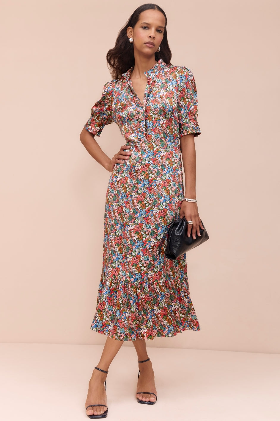 Front view of the Fabienne ditsy silk dress with button-up detail.