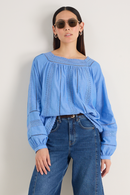 Close-up of the cuffs on the blue Melody square neck top