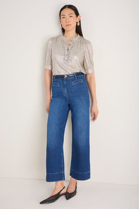 Full outfit featuring the metallic champagne top, dark denim, and black slingback shoes