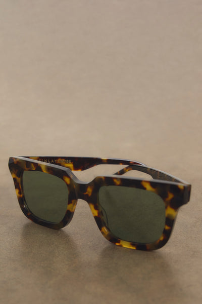 Rectangular light tortoiseshell frames with green ZEISS lenses