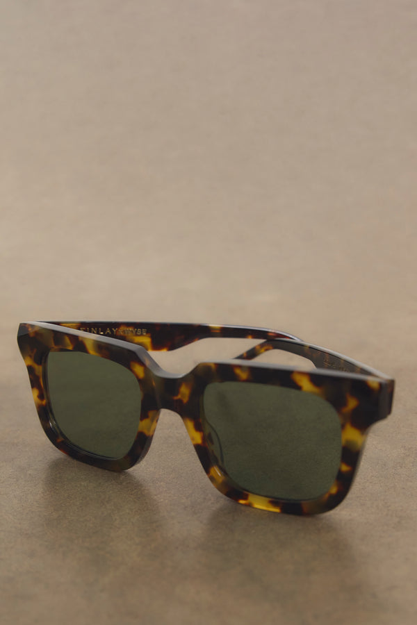Rectangular light tortoiseshell frames with green ZEISS lenses