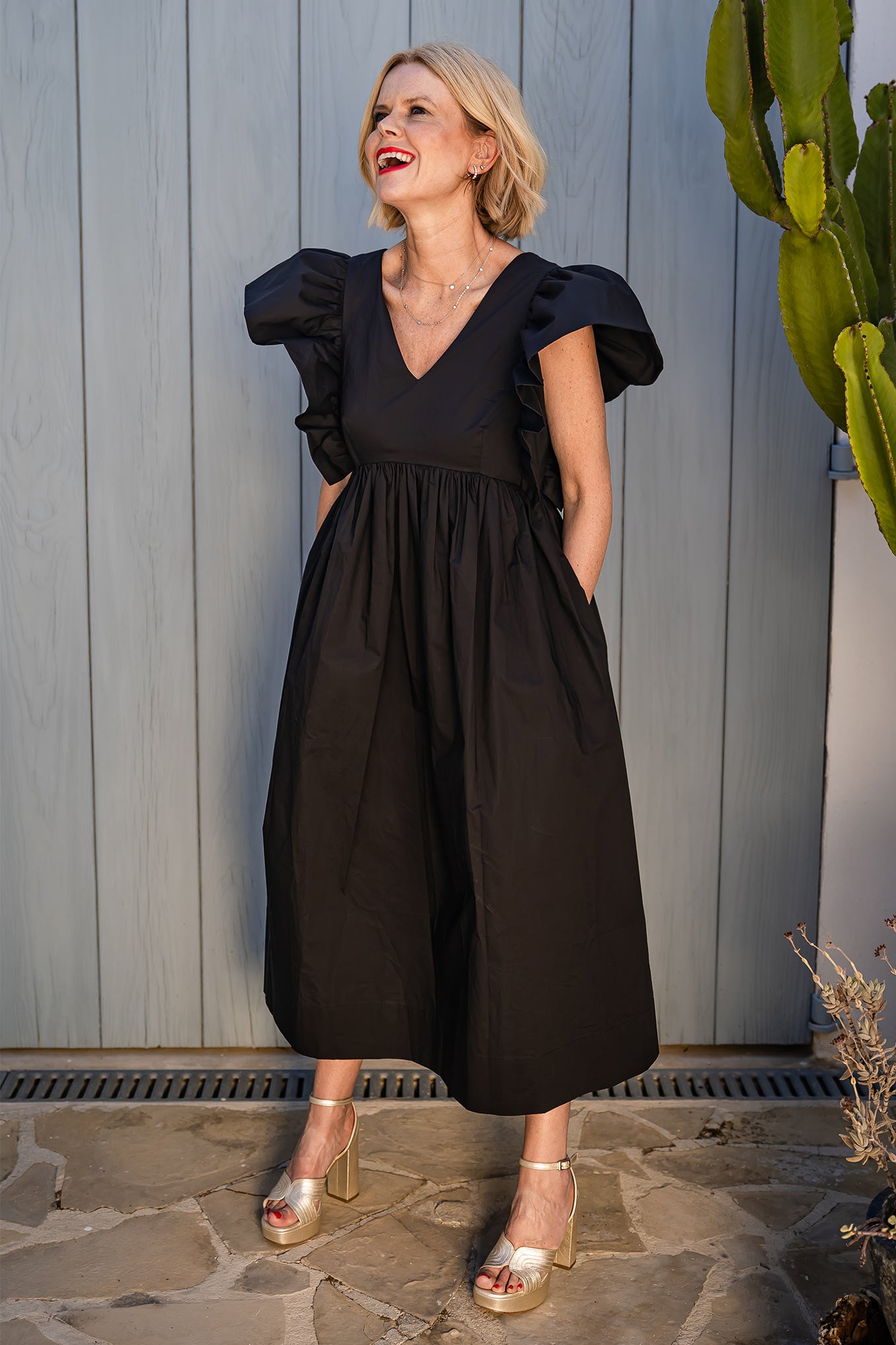 https://www.wyselondon.com/cdn/shop/products/emmeline-black-dress_1_1358x.jpg?v=1685178143